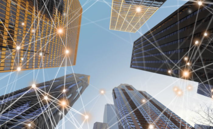 Four skyscraper buildings with blockchain data points overlaid